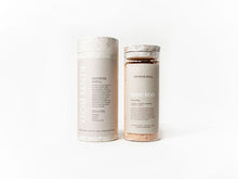 Load image into Gallery viewer, Two cylindrical containers labeled 'Shower Spell' and 'Kind Bod' on a white background