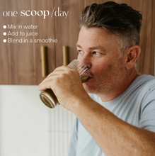 Load image into Gallery viewer, Man drinking from a glass with text about supplement usage