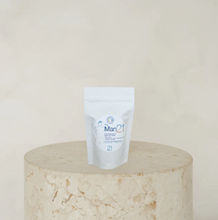 Load image into Gallery viewer, Man21 supplement package on a beige marble surface with a light beige background