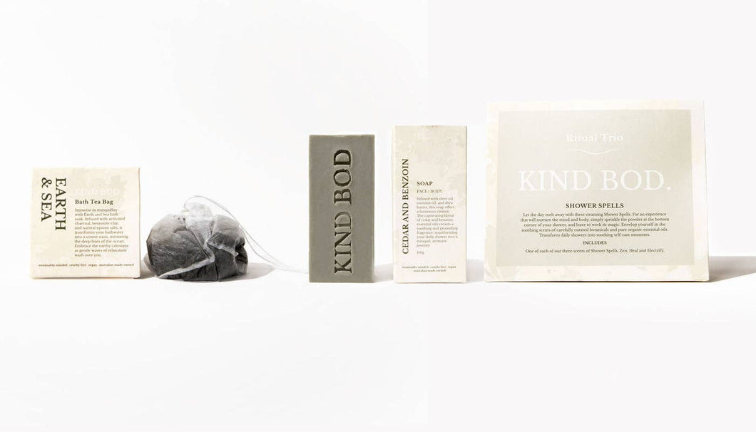 Collection of 'Kind Bod' products including a tea bag and boxes on a white background