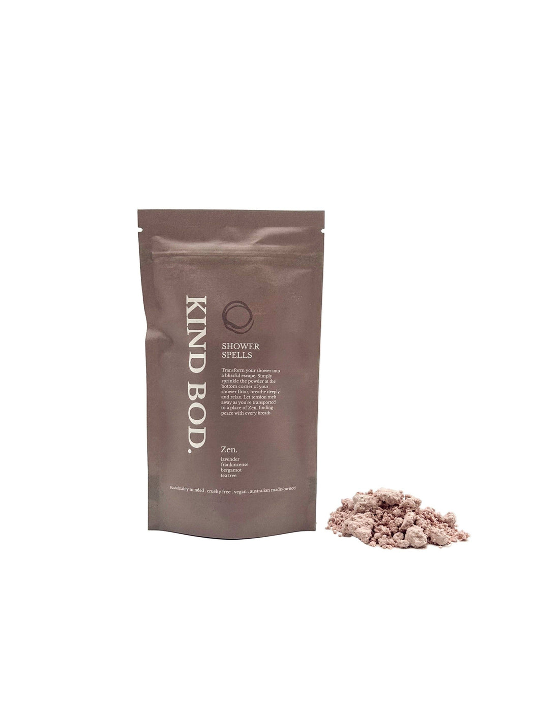 Kind Bod shower salt package with a small pile of shower salt on a white background