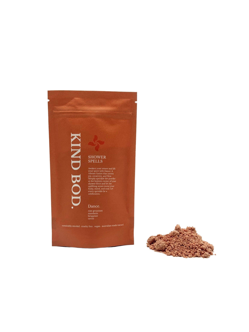 Brown package of 'Kind Bod' with a small pile of brown powder on a white background