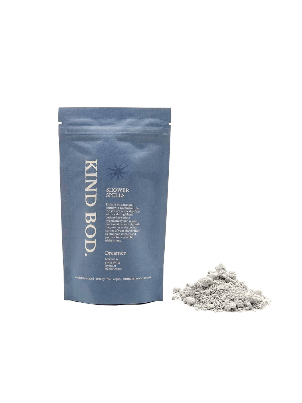 Blue packaging of 'Kind Bod' with a pile of white powder on a white background