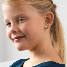 Load image into Gallery viewer, Smiling girl with clear skin wearing star-shaped stud earrings, close-up portrait
