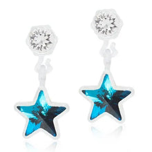 Load image into Gallery viewer, Blue crystal star dangle earrings with silver settings on white background
