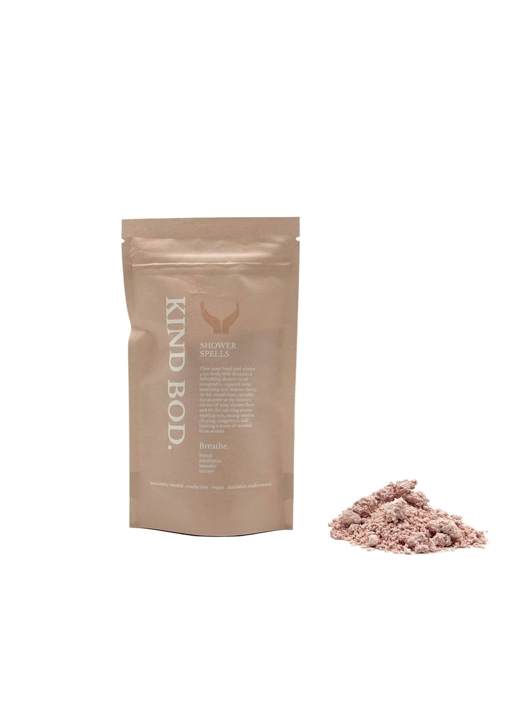 Kind Bod product packaging with a small pile of powder on a white background