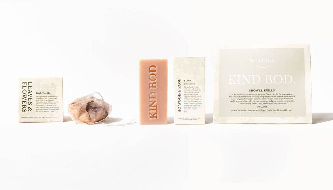 Collection of 'Kind Bod' products including soap and packaging on a white background
